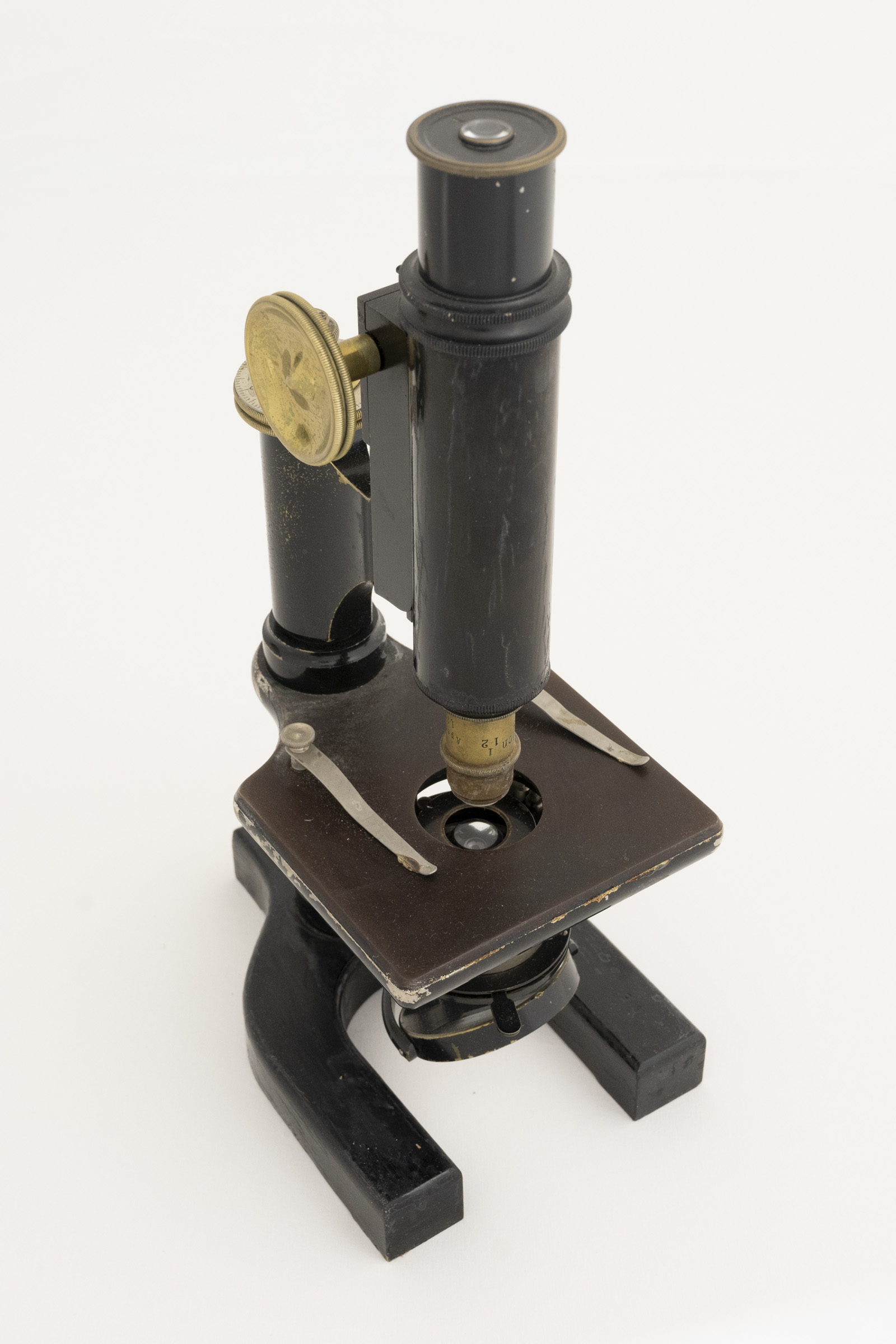 Black and brass microscope