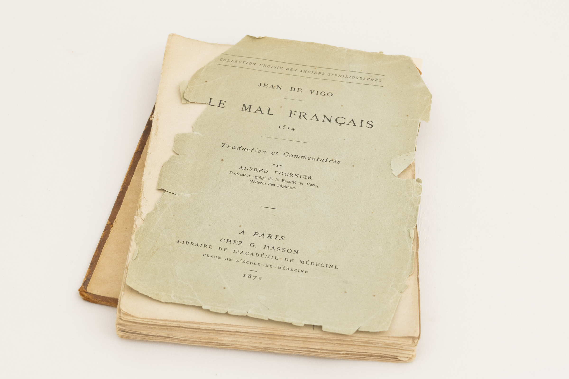 Worn copy of Le Mal Francais with pale green-blue cover