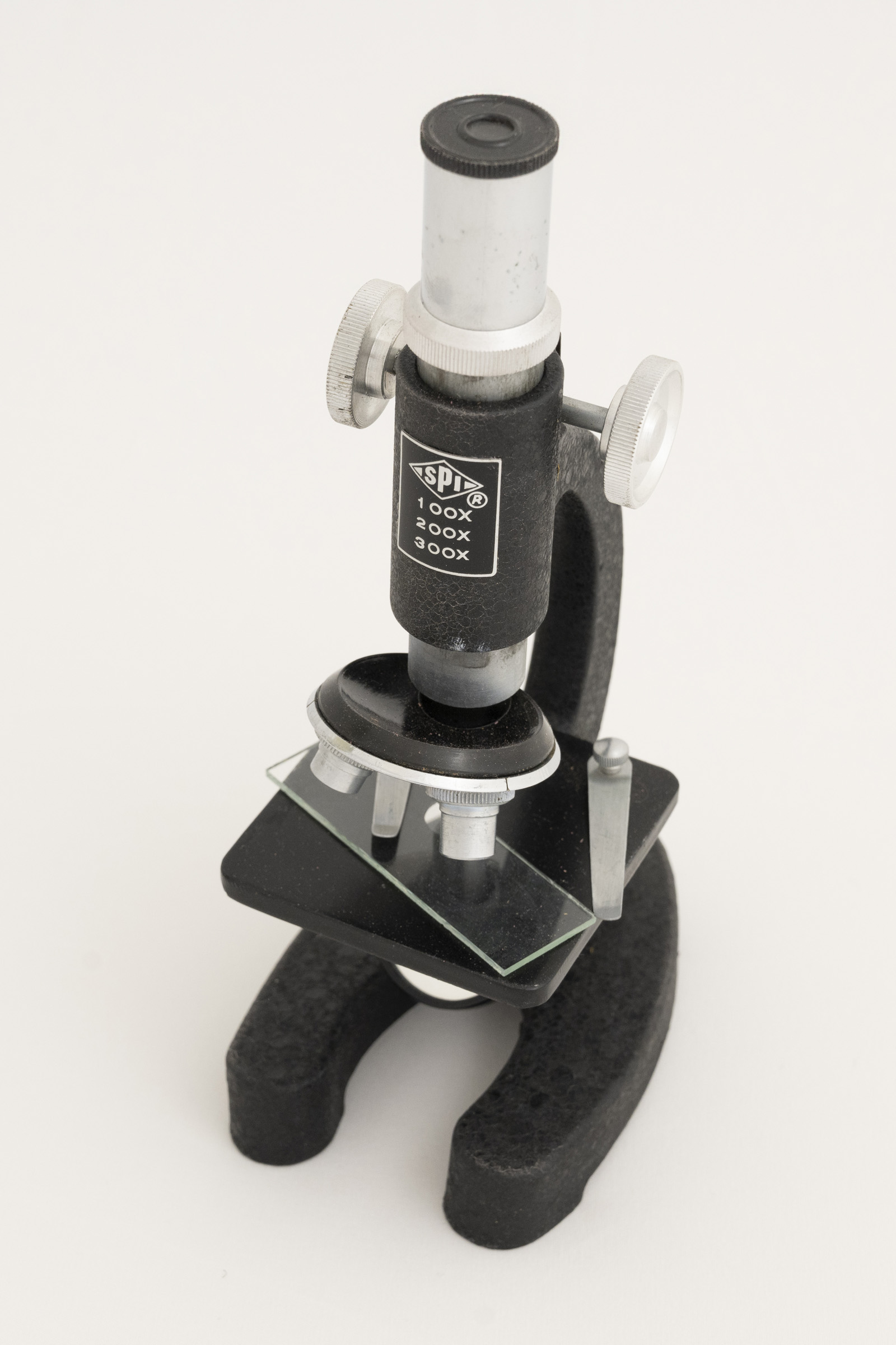 Small black and silver microscope