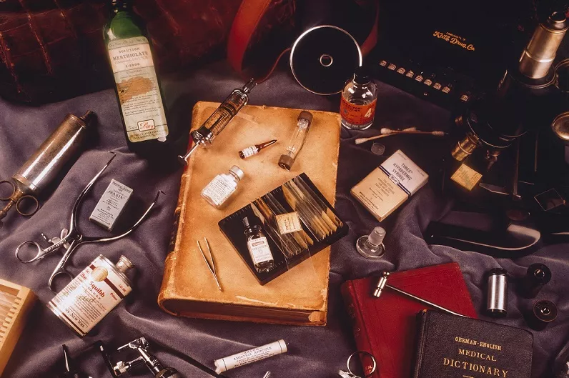 Display of antique medical tools and books