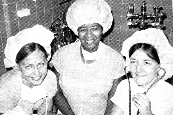 Three nursing students in surgical gear